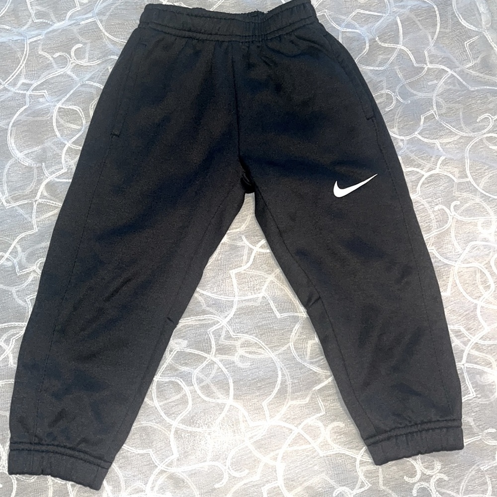 Sleek Black Nike Dri-Fit pants for Toddlers. 2T